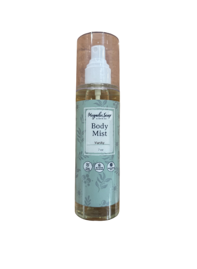 Body mist in a clear bottle with a light green label and botanical design.