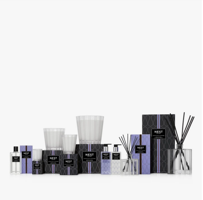 A collection of Nest New York Cedar Leaf & Lavender home fragrance products.