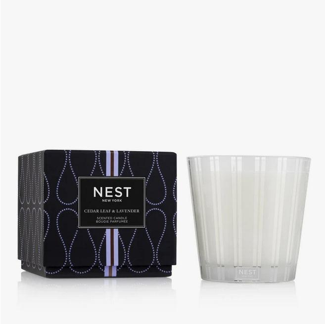 A Nest New York Cedar Leaf & Lavender 3-wick candle and its patterned box.