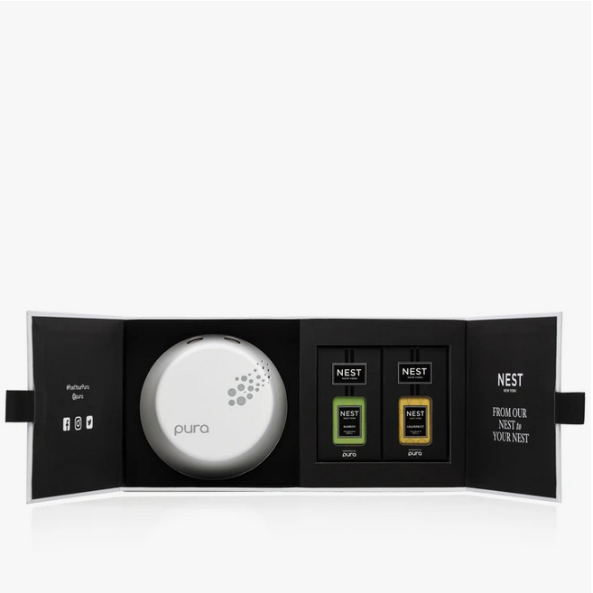 A Pura Smart Home Diffuser Set with a white diffuser and two fragrance vials.
