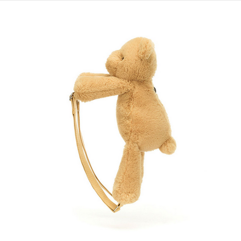 Smudge Bear Backpack, a plush brown teddy bear with a light brown strap.