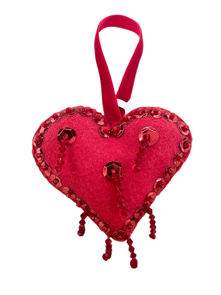 Red felt heart ornament with red sequins and beaded fringe.