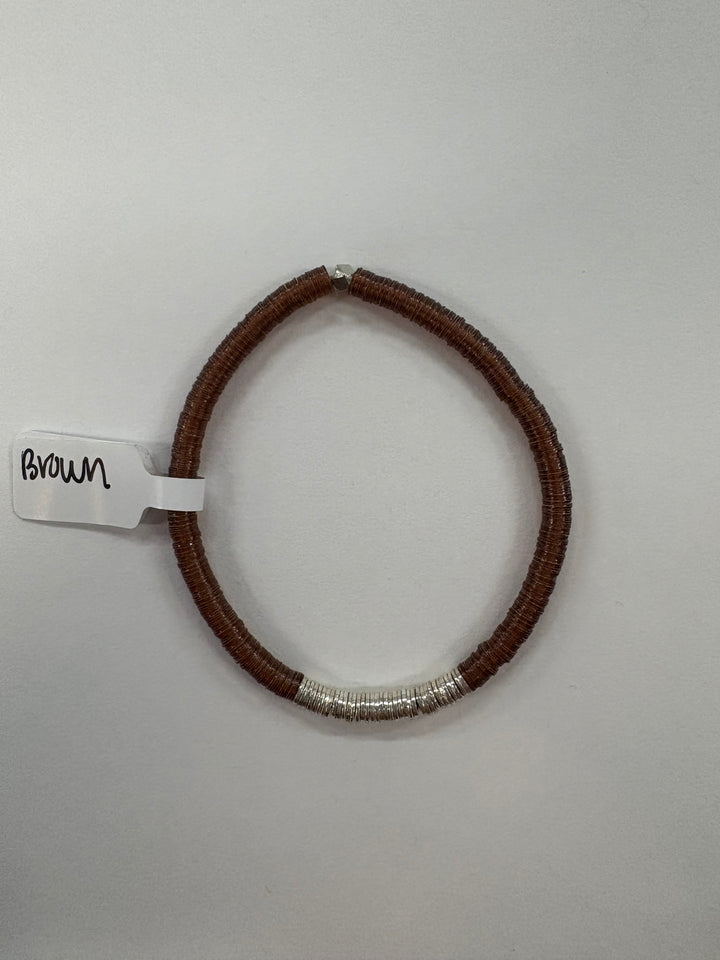 Small flat bead bracelet with brown beads and silver accents.