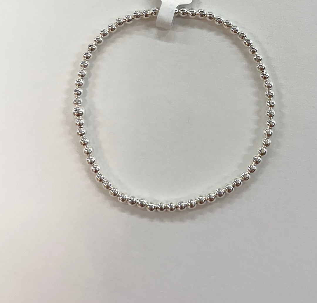 Sterling silver beaded bracelet on a white background.
