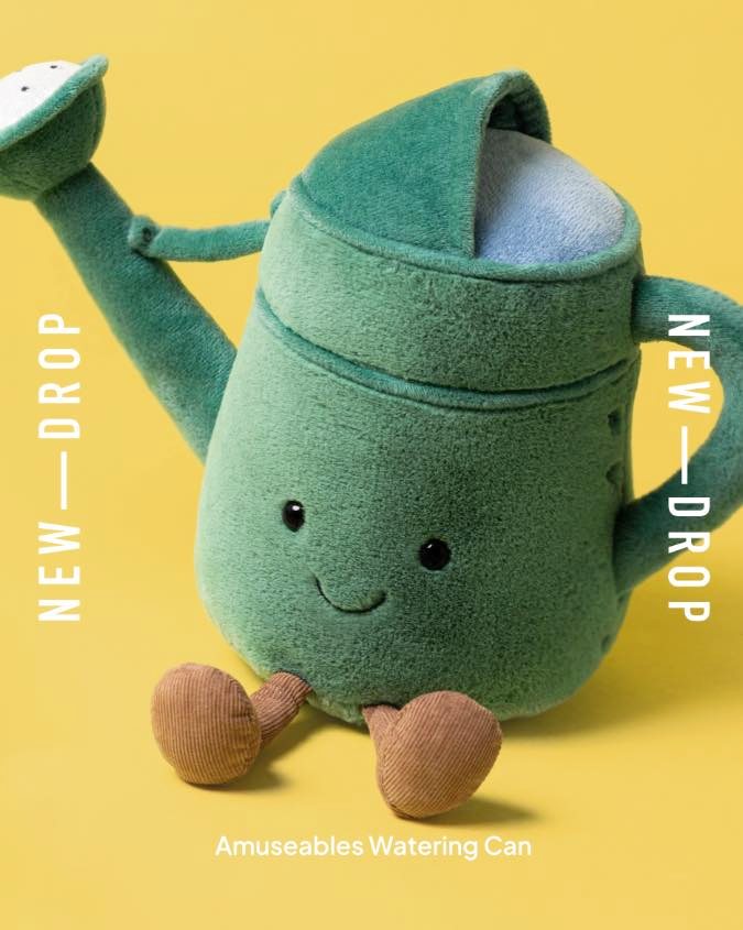 Amuseables Watering Can plush toy with a smiling face and corduroy legs.