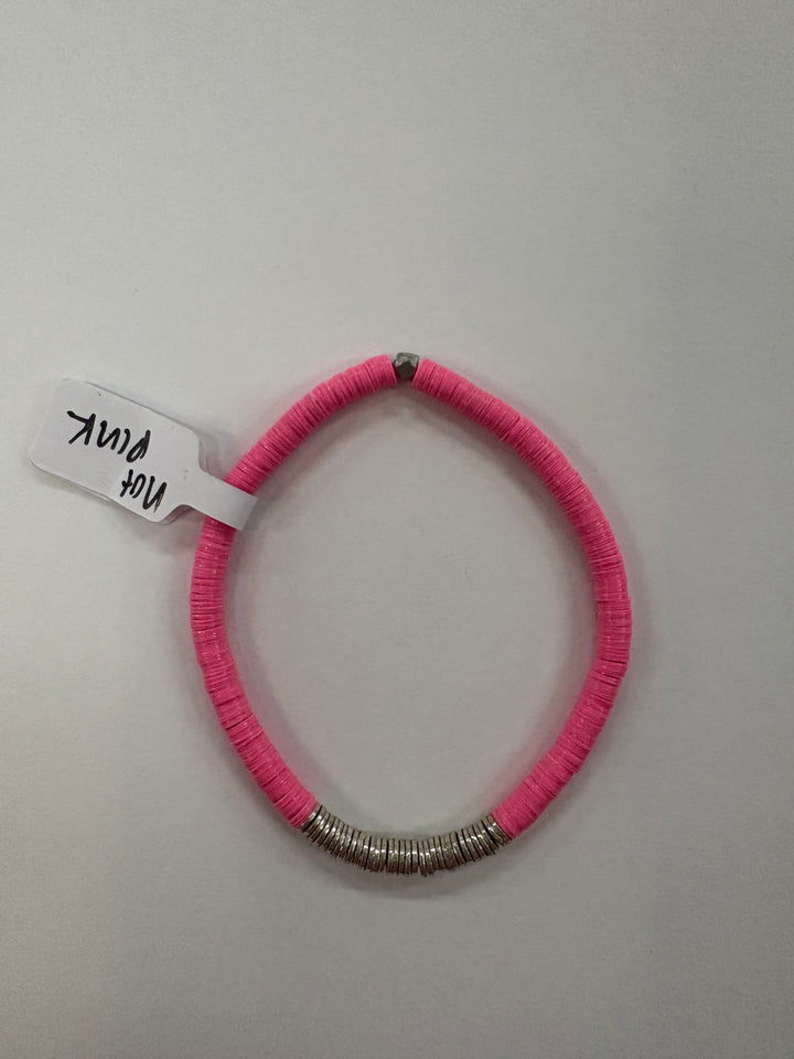 Small flat bead bracelet with pink vinyl beads and silver-plated accents.