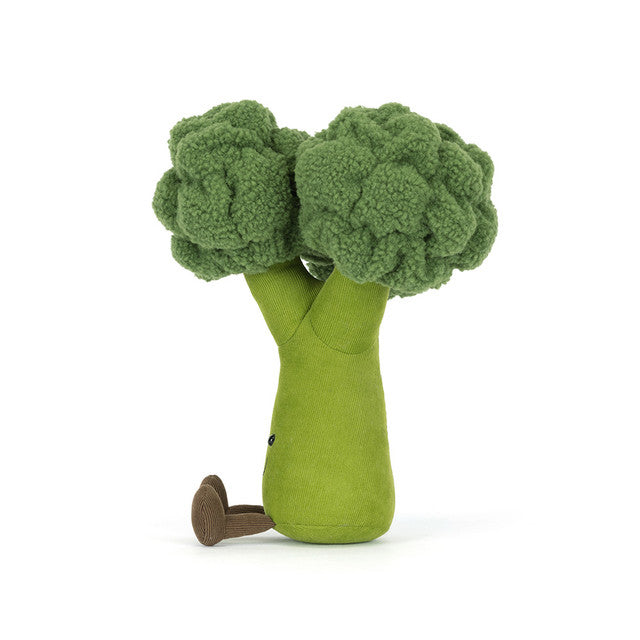 A plush broccoli toy with green florets and a green stalk.