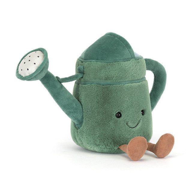A plush green watering can with a smiling face and brown feet.