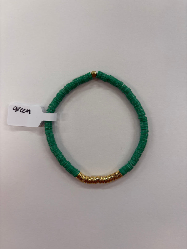 Small flat bead bracelet with green vinyl beads and gold-plated accents.