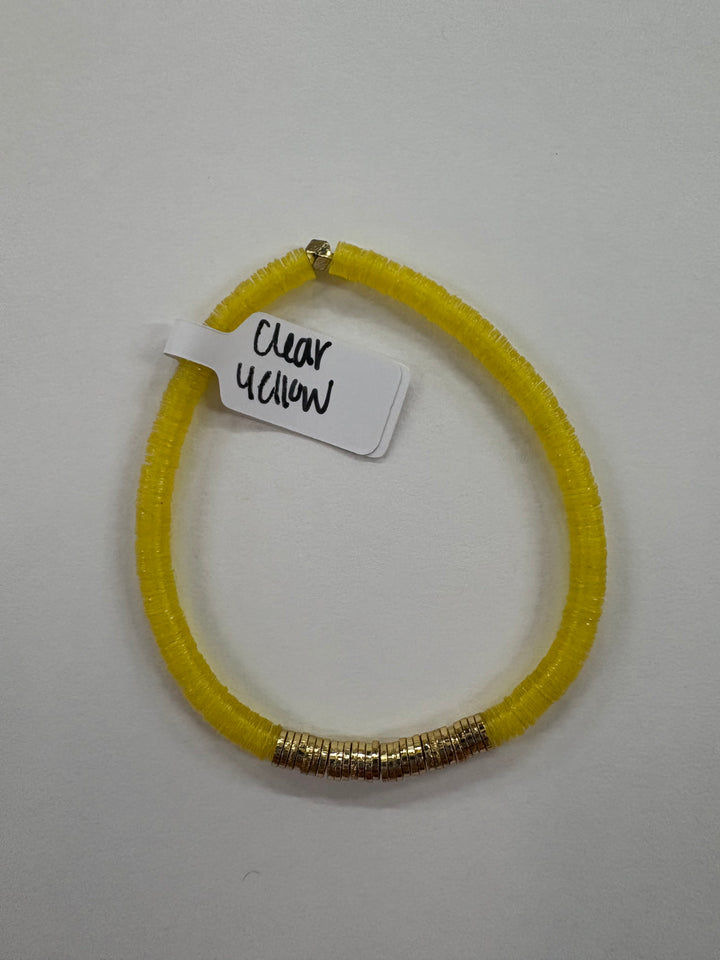 Small flat bead bracelet with clear yellow vinyl beads and gold-plated accents.