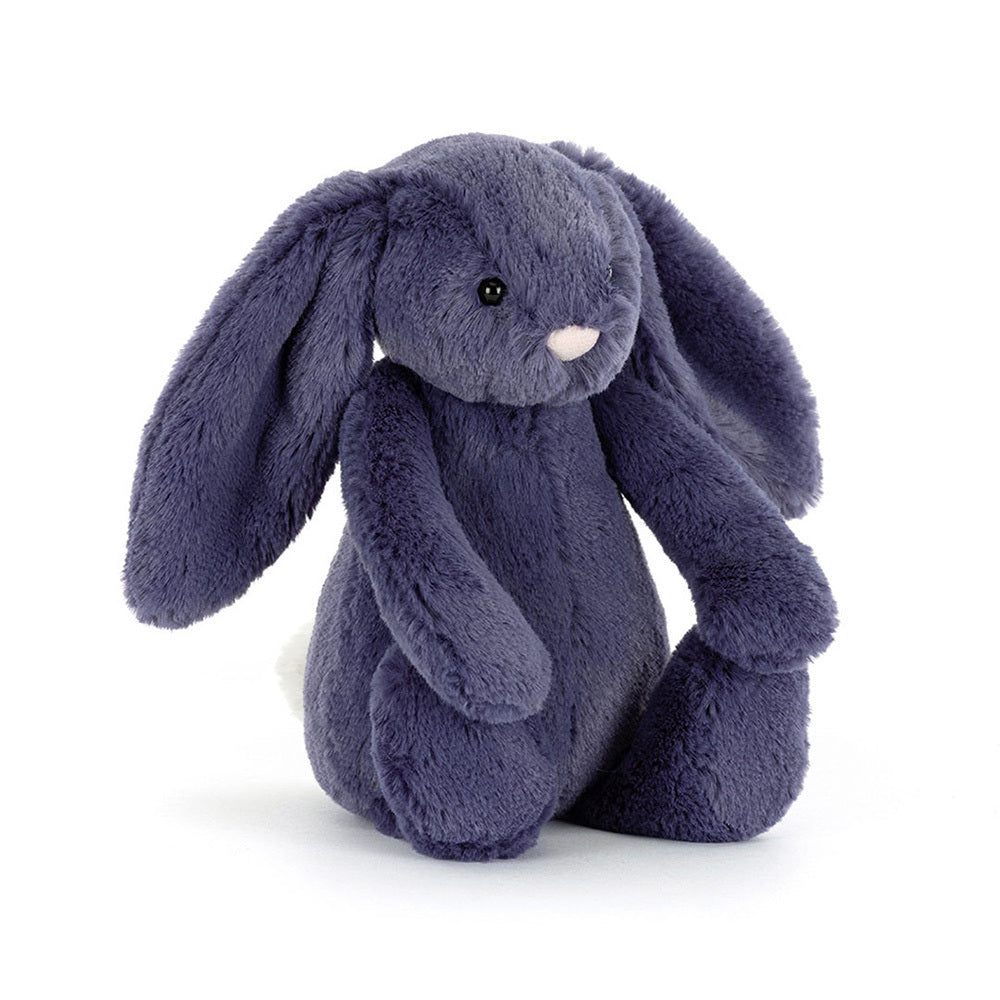 A plush, dark purple bunny with long floppy ears and a white fluffy tail.