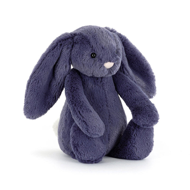 A plush, dark purple bunny with long floppy ears and a white fluffy tail.