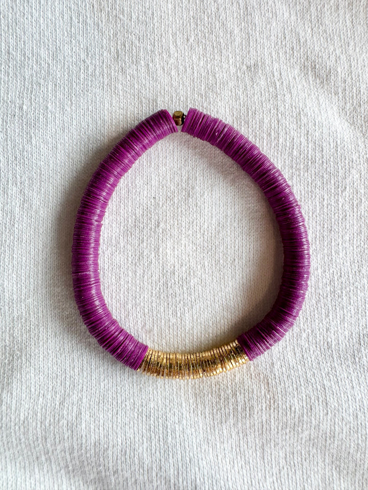 Large flat bead bracelet with purple vinyl beads and gold-plated accents.