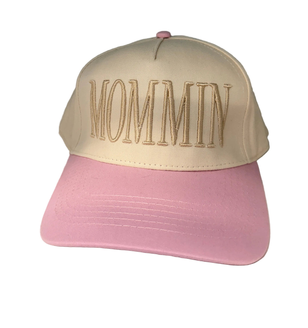 Mommin canvas embroidered hat with cream crown and pink brim.