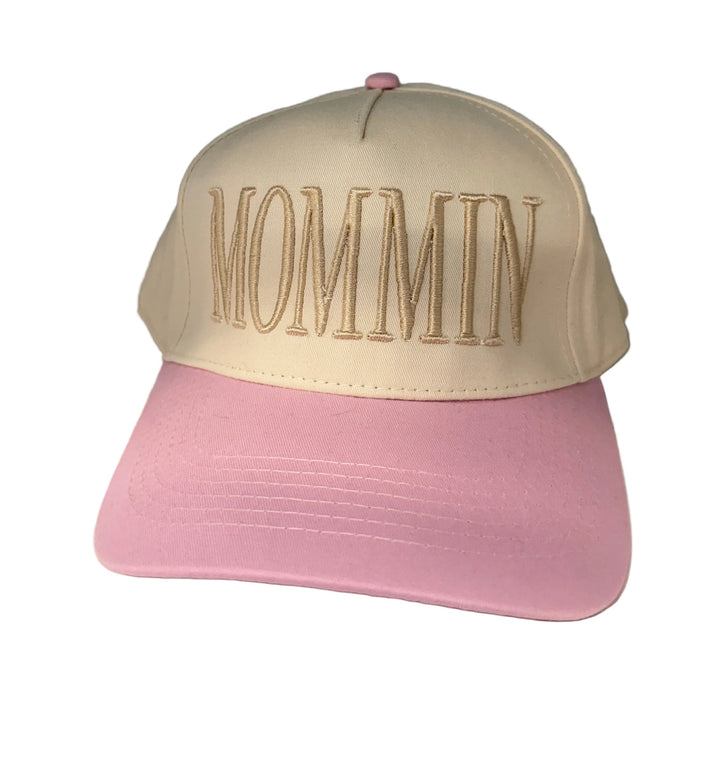 Mommin canvas embroidered hat with cream crown and pink brim.