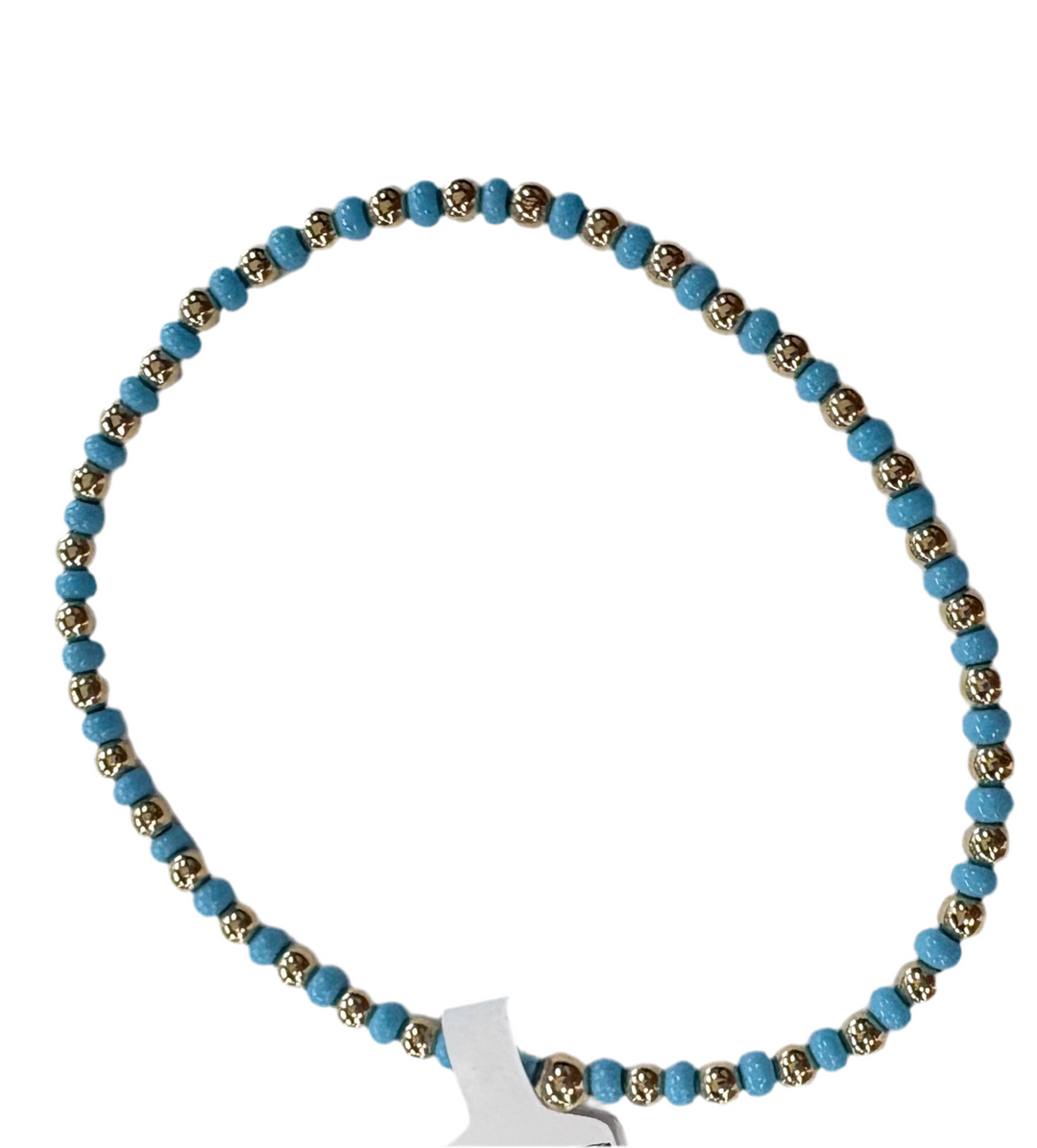 A round bracelet with alternating gold and light blue glass beads.