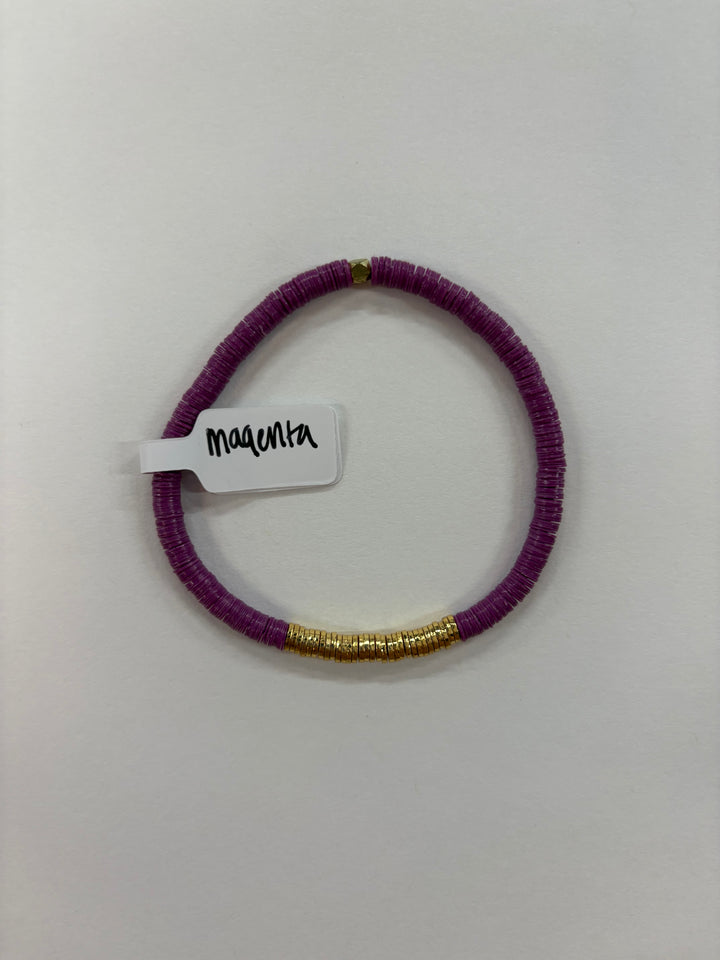 Small Flat Bead Bracelet in magenta with gold accents.
