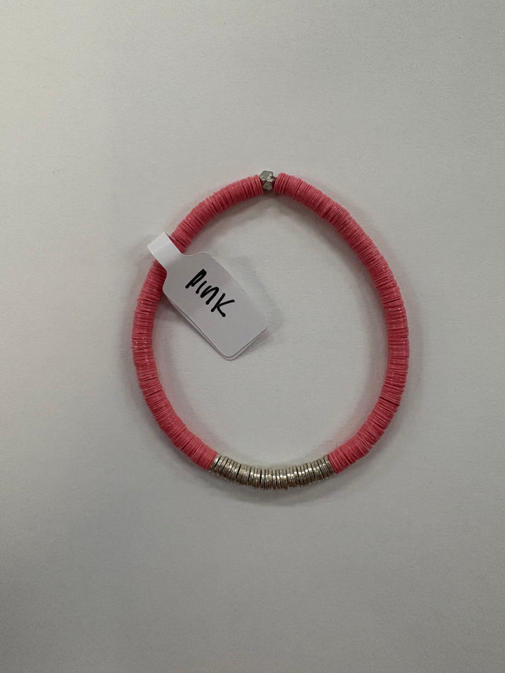 Pink flat bead bracelet with silver-plated accents and a tag reading "Pink."