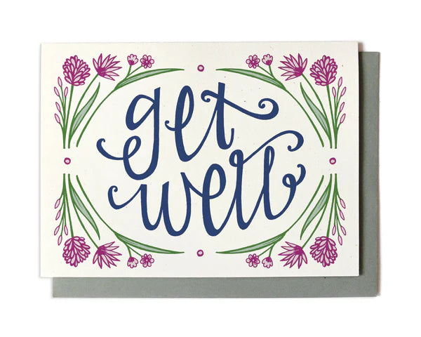 A get well card with floral accents and handwritten text.
