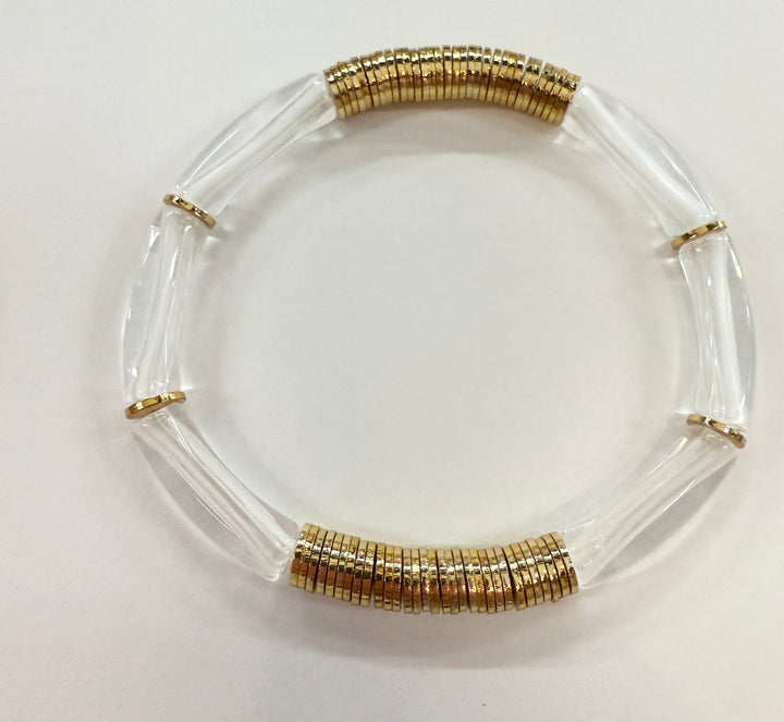 Noodle bracelet with clear acrylic noodle beads and gold-plated disc beads.