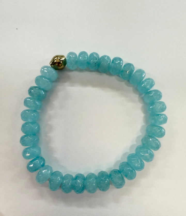 Jade Bead Bracelet with a single gold bead.