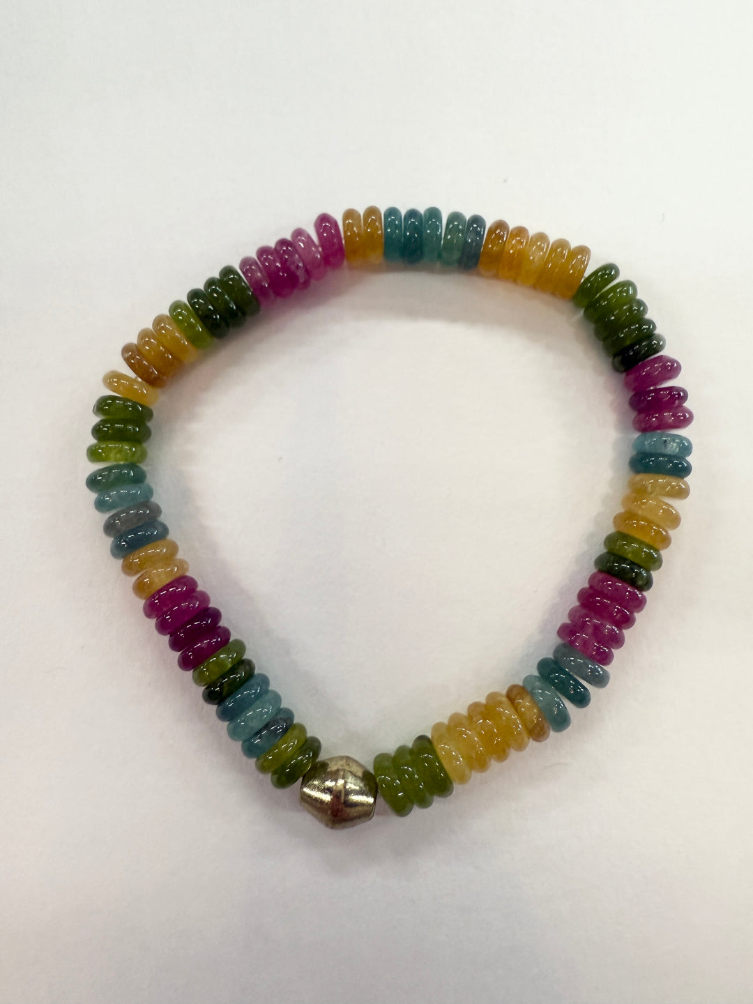 Jade bead bracelet with multicolored beads and a gold-colored clasp.