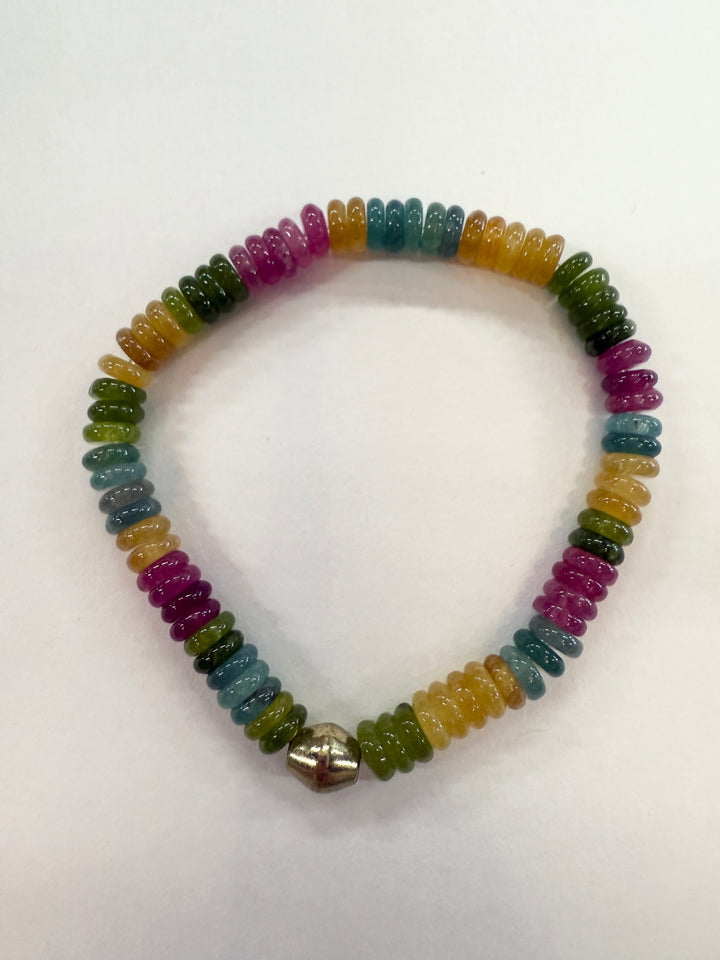 Jade bead bracelet with multicolored beads and a gold-colored clasp.