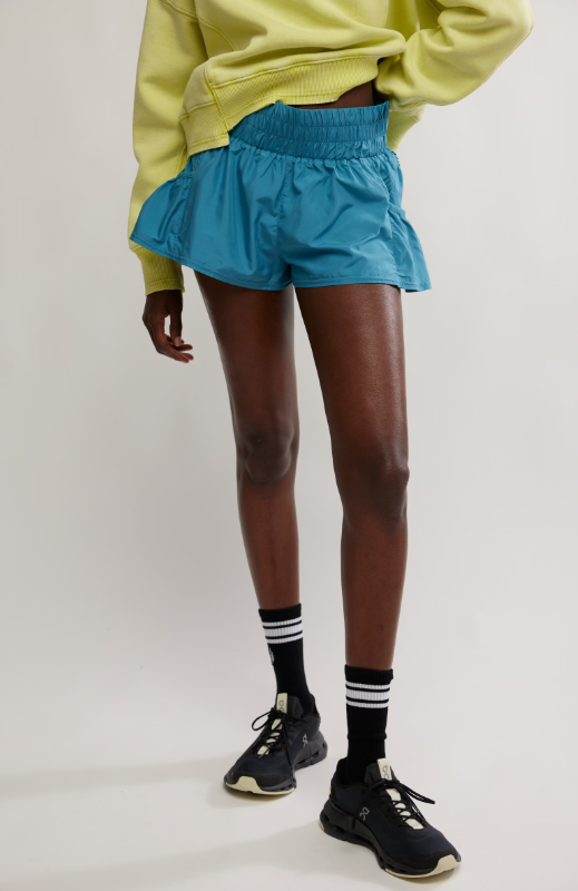Celestial blue shorts with a high-rise elastic waistband and pleated details.