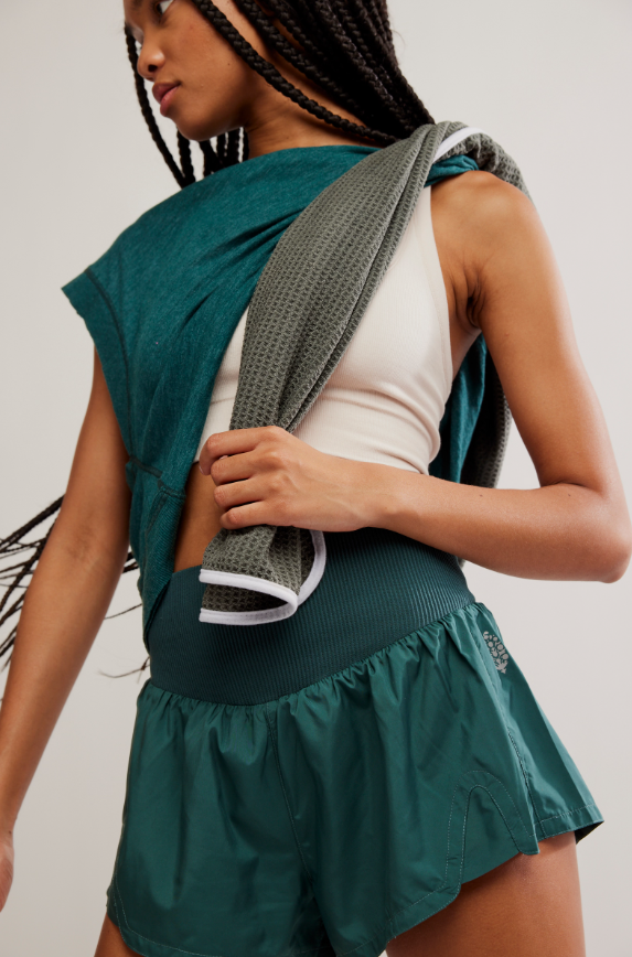 Carpe Diem shorts in evergreen with a knit waistband and built-in briefs.