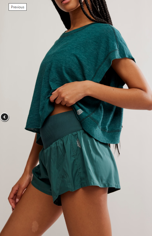 Evergreen Carpe Diem shorts with a high-rise knit waistband.
