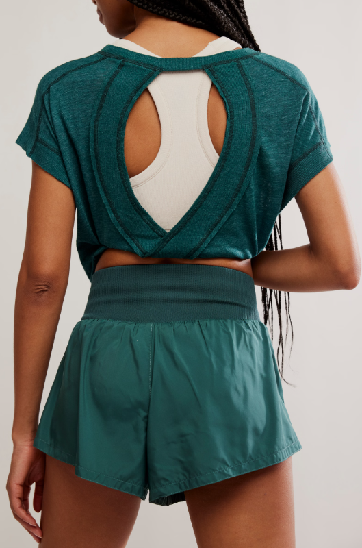 Evergreen shorts with a high-rise knit waistband and a cutout back top.