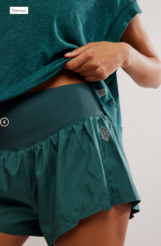 Evergreen Carpe Diem shorts with a high-rise knit waistband and built-in briefs.