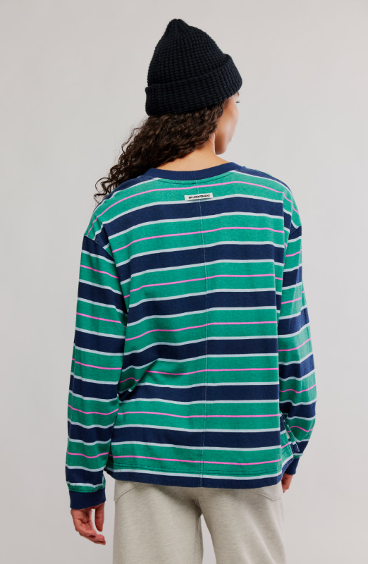 Navy and green striped long-sleeve shirt with a black beanie.