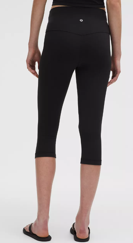 Black Lululemon Align high-rise crop leggings with a logo on the back.