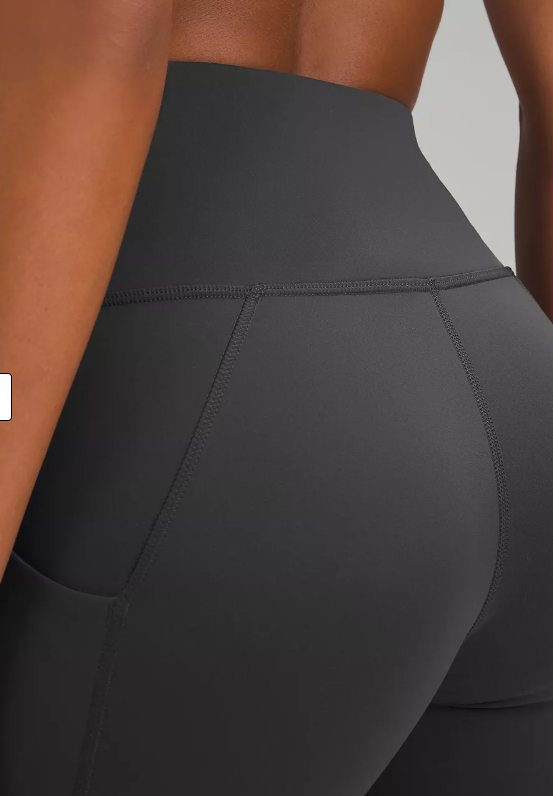 Graphite grey Wunder Train high-rise leggings with pockets.