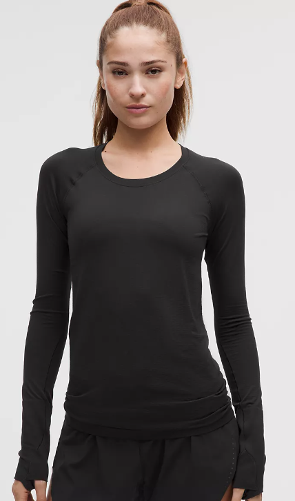 Black seamless long-sleeve top with thumbholes.