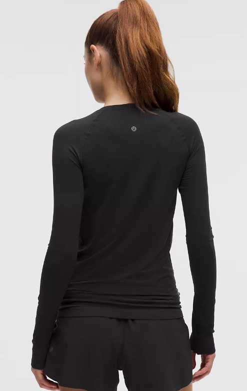 Black Swiftly Long Sleeve 2.0 top with thumbholes.