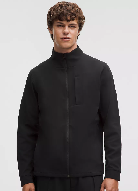Black Sojourn jacket with a high collar and zippered front.