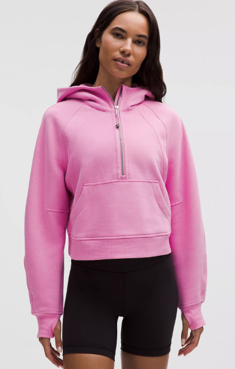 A pink frosting scuba oversized half-zip hoodie with a kangaroo pocket.