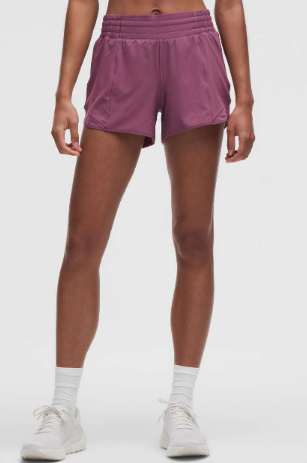 Women's purple high-rise lined running shorts with a 4-inch inseam.