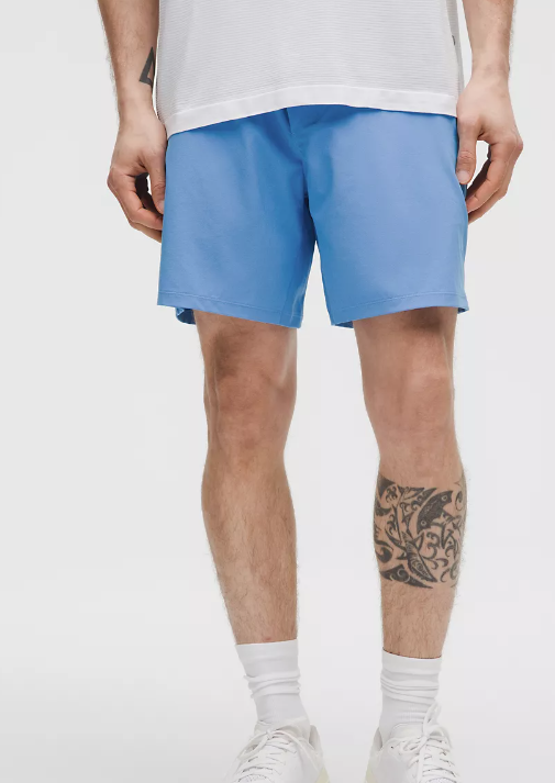 Men's blue Pace Breaker Linerless shorts with a tattoo on the leg.