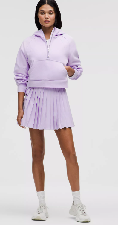 Oversized lavender half-zip hoodie with a kangaroo pocket.