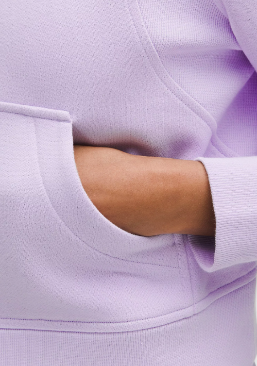Lavender Frost Scuba Oversized Half-Zip Hoodie with a hand in the pocket.