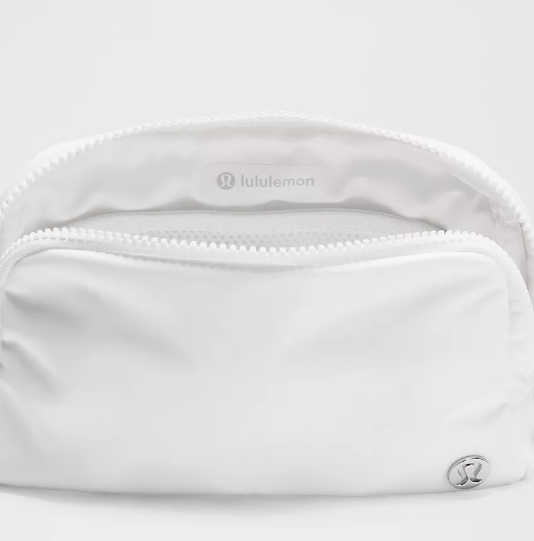 White Lululemon Everywhere Belt Bag with silver logo detail.