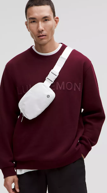 White Everywhere Belt Bag with adjustable strap.