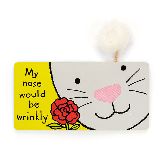 A board book featuring a bunny face with a pink nose and a red rose, with text "My nose would be wrinkly".