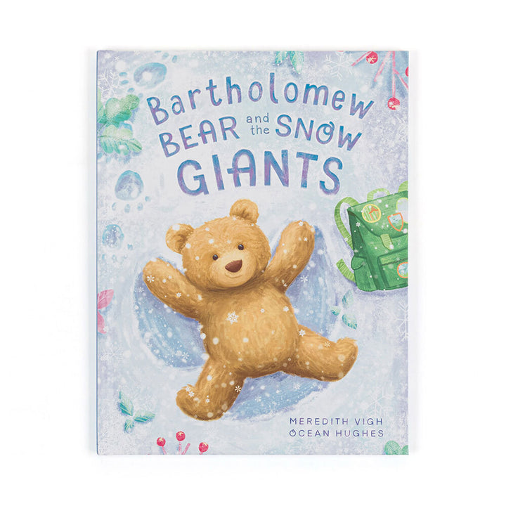A children's book cover shows a teddy bear making a snow angel.