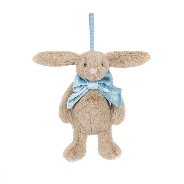 A plush beige bunny ornament with long ears and a light blue bow.