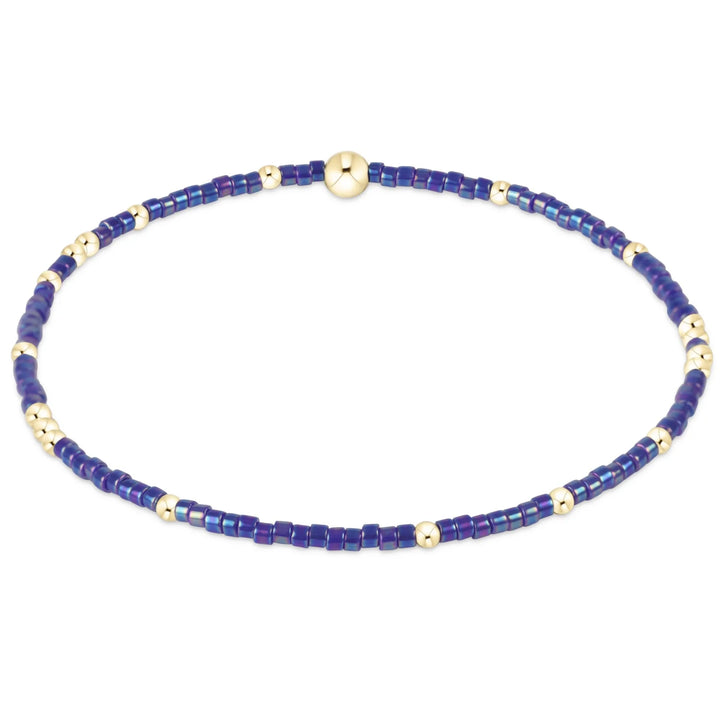 Blue metallic seed bead bracelet with gold-filled beads.