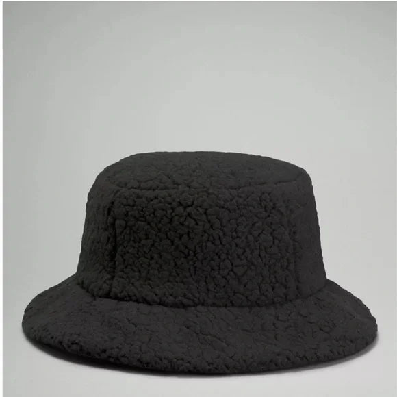 Black textured fleece bucket hat with a wide brim.
